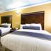 Hollywood Palms Inns & Suites in Los Angeles: guest room with two double beds and sky-painted ceiling