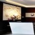 Vio Hotel Cimanuk Bandung lobby reception desk in Bandung with modern wood-paneled wall