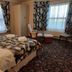 The Arundel Park Hotel, Arundel: twin room with patterned curtains, bay windows and bed