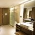 Hotel Midtown Richardson Taipei City bathroom with double vanity, shower and toilet