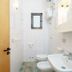 Agriturismo Serafina bathroom in Otranto with sink, bidet, toilet and shower