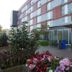 Humber College Lakeshore Residence in Toronto entrance with flower beds and bike racks
