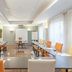 Appart'City Classic Genève - Gaillard meeting room with U-shaped tables and orange chairs in Gaillard