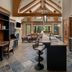 Hotel Park City, Autograph Collection kitchen with island, vaulted wood beams and dining area in Park City