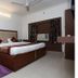 Vishal Hotel Near New Delhi Railway Station room with double bed, ceiling fan and window AC in New Delhi