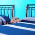 Hotel Posada Don Matias, Oaxaca: twin beds with blue striped bedding and rolled towels