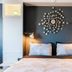 Big Bear Spa Suites in Big Bear Lake: king bed with black accent wall and decorative wall art