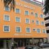 JB City Hotel in Johor Bahru, orange facade with many windows and street-level entrance