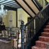 Hotel Palacio La Casona de Cerrazo in Cerrazo: grand staircase with red runner and classic lounge seating