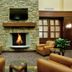 Holiday Inn Express & Suites Wilmington-Newark lobby with stone fireplace, TV, and leather seating in Newark