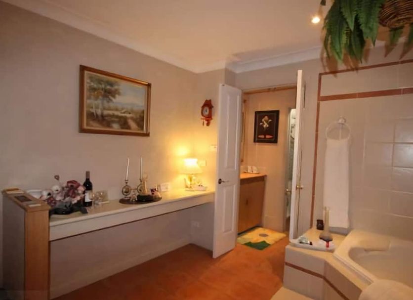 Kalimna Spa Room in Blackheath with spa bath, vanity area and open bathroom doorway