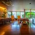 Oriental Hills Okinawa spa treatment room in Onna with massage tables and large garden-view windows