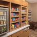 Canal Street New Orleans hotel snack display with mini fridge and shelves of packaged snacks