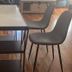 Nwk 457 Room 111-A in Newark featuring a small table with black chairs and wood flooring
