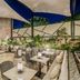 Grand Fiesta Americana Guadalajara Country Club outdoor terrace lounge with seating and greenery