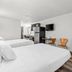 Studio 6 King of Prussia PA Philadelphia room with two beds, kitchenette, TV and chairs