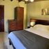 Sofia's B&B Hostal Boutique in Panama City, guest room with double bed, bedside lamps and wardrobe