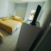 Tagüe, Gualeguaychú: simple hotel room with two twin beds and a TV
