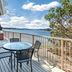 Worldmark Deer Harbor waterfront deck with hot tub, table, chairs and ocean view