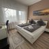 Hotel Hasselberg, Kaiserslautern: double room with twin beds, desk, and window with sheer curtains