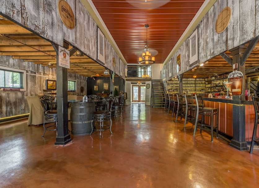 Bourbon Manor Bed & Breakfast Inn in Bardstown lobby-style bar with rustic decor and polished floor