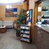Hotel La Costera in A Lanzada lobby with seating area, brochure rack, plants and reception desk
