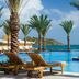 JW Marriott St. Maarten Beach Resort & Spa poolside with palm trees and ocean view in Upper Prince's Quarter