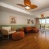 Pousada dos Sonhos in Florianopolis lounge with balcony doors, wood ceiling fan and leather seating