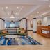 Fairfield Inn & Suites by Marriott Greenwood lobby with seating area and front desk