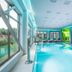 Stella Village Seaside Hotel indoor pool with loungers in Hersonissos