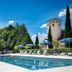 Domaine et Golf de Vaugouard - La Maison Younan poolside with loungers and blue umbrellas in Fontenay-sur-Loing
