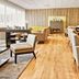 Akureyri - Berjaya Iceland Hotels lounge with fireplace, seating area and wood floors in Akureyri