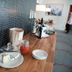 Breakfast buffet at Tärnaby Fjällhotell in Tärnaby with cheese, jam, juice, plates and coffee