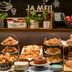 Motel One Frankfurt-Messe breakfast buffet with pastries, bread, fruit and coffee station in Frankfurt am Main
