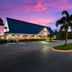 Red Roof Inn Vero Beach - I-95 exterior at dusk with palm trees and parking lot in Vero Beach