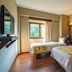 Gazelle Resort & Spa in Karacasu twin guest room with window and wood flooring