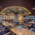 Griya Persada Convention Hotel & Resort Kaliurang in Pakem, stylish restaurant with mushroom-shaped ceiling feature