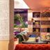 Riad Karmela Princesse in Marrakech, colorful lounge with patterned sofas, mosaic wall, and chandelier