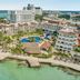Fiesta Americana Cancun Villas in Cancún with oceanfront beach, pools, and resort buildings
