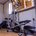 Deen Apartment Services Lagos fitness room with treadmill, exercise bike and cable machine