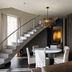 Tufenkian Historic Yerevan Hotel in Yerevan, modern lounge with staircase and round dining table