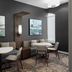 Residence Inn by Marriott Fort Worth Cultural District seating area with tables, chairs and framed artwork