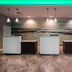 La Quinta Inn & Suites by Wyndham Virginia Beach lobby front desk with ocean mural