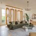 1.75 Paris La Source in Paris living room with olive sofa, tan lounge chair, and large window light