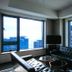 Benikea Hotel Haeundae in Busan, lounge with corner windows overlooking the city and sea