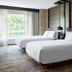 Chicago Marriott Southwest at Burr Ridge guest room with two white beds and large window