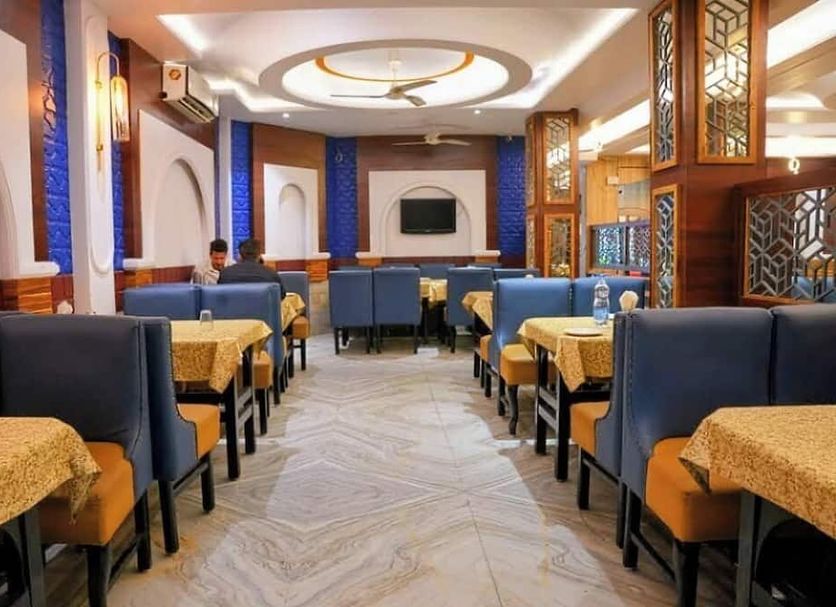 Townhouse Jabalpur Railway Junction Form restaurant seating area in Jabalpur