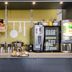 B&B HOTEL Calais Centre St Pierre breakfast buffet with pastries, fruit, coffee, and juice dispensers in Calais