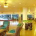 Chariot Beach Resort in Mahabalipuram lobby lounge with seating and garden views