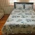 Penguen House & Bungalows Sapanca room with double bed and patterned bedding